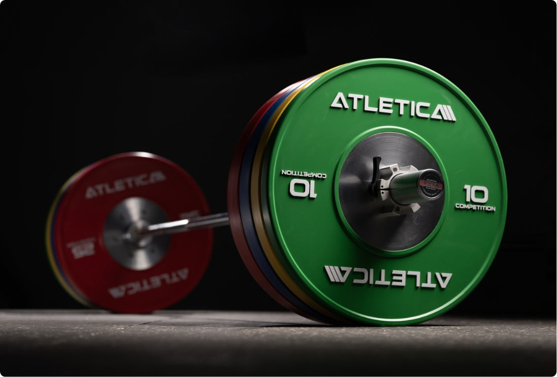 Hantelstange Yota für Athletinnen, beladen mit Competition Bumper Plates